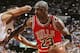 RICHFIELD, OH - CIRCA 1991: Michael Jordan #23 of the Chicago Bulls dribbles against the Cleveland Cavaliers circa 1991 at the Richfield Coliseum in Richfield, Ohio. NOTE TO USER: User expressly acknowledges and agrees that, by downloading and or using th