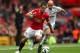 MANCHESTER, ENGLAND - AUGUST 16: Javier Hernandez of Manchester United competes with Jonjo Shelvey of Swansea City during the Barclays Premier League match between Manchester United and Swansea City at Old Trafford on August 16, 2014 in Manchester, Engl