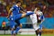 RECIFE, BRAZIL - JUNE 29: Sokratis Papastathopoulos of Greece challenges Joel Campbell of Costa Rica during the 2014 FIFA World Cup Brazil Round of 16 match between Costa Rica and Greece at Arena Pernambuco on June 29, 2014 in Recife, Brazil. (Photo by