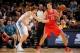 DENVER, CO - April 9: Donatas Motiejunas #20 of the Houston Rockets handles the ball against the Jan Vesely #24 of the Denver Nuggets on April 9, 2014 at the Pepsi Center in Denver, Colorado. NOTE TO USER: User expressly acknowledges and agrees that, by d