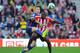 SUNDERLAND, ENGLAND - AUGUST 24: Jozy Altidore of Sunderland is challenged by Michael Keane of Manchester United during the Barclays Premier League match between Sunderland and Manchester United at Stadium of Light on August 24, 2014 in Sunderland, Engla