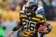 PITTSBURGH, PA - NOVEMBER 17: Le'Veon Bell #26 of the Pittsburgh Steelers looks for yards during a second quarter run in front of DeAndre Levy #54 of the Detroit Lions at Heinz Field on November 17, 2013 in Pittsburgh, Pennsylvania. (Photo by Gregory Sha