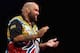 SYDNEY, AUSTRALIA - AUGUST 29: Kyle Anderson of Australia celebrates victory in his quarter-final match against Simon Whitlock of Australia during the Sydney Darts Masters at Hordern Pavilion on August 29, 2014 in Sydney, Australia. (Photo by Mark Kolbe
