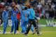 CARDIFF, WALES - AUGUST 27: England batsman Joe Root leaves the field after being bowled by Bhuvneshwar Kumar (2nd left) during the 2nd Royal London One Day International match between England and India at SWALEC Stadium on August 27, 2014 in Cardiff, W