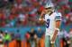 MIAMI GARDENS, FL - AUGUST 23: Tony Romo #9 of the Dallas Cowboys looks on during a preseason game against the Miami Dolphins at Sun Life Stadium on August 23, 2014 in Miami Gardens, Florida. (Photo by Mike Ehrmann/Getty Images)