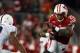 Nov 30, 2013; Madison, WI, USA; Wisconsin Badgers running back Melvin Gordon (25) rushes for yardage as Penn State Nittany Lions cornerback Trevor Williams (10) defends at Camp Randall Stadium. Penn State defeated Wisconsin 31-24. Mandatory Credit: Mary