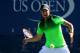 NEW YORK, NY - AUGUST 29: Dominic Thiem of Austria returns a shot against Ernests Gulbis of Latvia during their men's singles second round match on Day Five of the 2014 US Open at the USTA Billie Jean King National Tennis Center on August 29, 2014 in the
