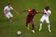 MANAUS, BRAZIL - JUNE 22: William Carvalho of Portugal takes on Graham Zusi and Kyle Beckerman of the United States during the 2014 FIFA World Cup Brazil Group G match between the United States and Portugal at Arena Amazonia on June 22, 2014 in Manaus, B