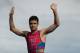 STOCKHOLM, SWEDEN - AUGUST 23: Threadneedle Leader winner Javier Gomez Noya from Spain waves on the top 3 podium during the Men Elite Ceremony at the ITU World Triathlon on August 23, 2014 in Stockholm, Sweden. (Photo by Gonzalo Arroyo Moreno/Getty Images