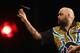 SYDNEY, AUSTRALIA - AUGUST 29: Kyle Anderson of Australia competes during his quarter-final match against Simon Whitlock of Australia during the Sydney Darts Masters at Hordern Pavilion on August 29, 2014 in Sydney, Australia. (Photo by Mark Kolbe/Getty