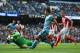 MANCHESTER, ENGLAND - AUGUST 30: Sergio Aguero of Manchester City has a shot saved by Asmir Begovic of Stoke City during the Barclays Premier League match between Manchester City and Stoke City at Etihad Stadium on August 30, 2014 in Manchester, England.