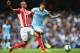 MANCHESTER, ENGLAND - AUGUST 30: Stevan Jovetic of Manchester City is tackled by Steven N'Zonzi of Stoke City during the Barclays Premier League match between Manchester City and Stoke City at Etihad Stadium on August 30, 2014 in Manchester, England. (Ph