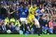 LIVERPOOL, ENGLAND - AUGUST 30: Cesc Fabregas of Chelsea is tackled by Sylvain Distin (L) and Steven Naismith of Everton during the Barclays Premier League match between Everton and Chelsea at Goodison Park on August 30, 2014 in Liverpool, England. (Phot