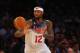 NEW YORK, NY - AUGUST 20: DeMarcus Cousins #12 of the USA passes against the Dominican Republic during their game at Madison Square Garden on August 20, 2014 in New York City. (Photo by Al Bello/Getty Images)