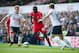 Christian Eriksen (left) played a big part in ensuring Spurs did not lose touch with Liverpool in the first-half.
