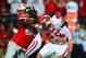 Sep 28, 2013; Columbus, OH, USA; Wisconsin Badgers quarterback Joel Stave (2) is sacked by Ohio State Buckeyes defensive lineman Michael Bennett (63) during the third quarter at Ohio Stadium. Mandatory Credit: Andrew Weber-USA TODAY Sports