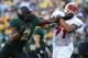 WACO, TX - AUGUST 31: (L-R) Shawn Oakman #2 of the Baylor Bears and Chauncey Briggs #71 of the Southern Methodist Mustangs at McLane Stadium on August 31, 2014 in Waco, Texas. (Photo by Ronald Martinez/Getty Images)
