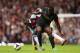 LONDON, ENGLAND - OCTOBER 19: Mohamed Diame of West Ham and Micah Richards of Manchester City battle for the ball during the Barclays Premier League match between West Ham United and Manchester City at Boleyn Ground on October 19, 2013 in London, Englan