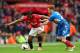 MANCHESTER, ENGLAND - MAY 06: Luis Antonio Valencia of Manchester United competes with Stephen Quinn of Hull City during the Barclays Premier League match between Manchester United and Hull City at Old Trafford on May 6, 2014 in Manchester, England. (Ph