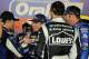 HAMPTON, GA - AUGUST 31: (L-R) Jeff Gordon, driver of the #24 Panasonic Chevrolet, Jimmie Johnson, driver of the #48 Lowe's/Kobalt Tools Chevrolet, and his crew chief, Chad Knaus, congratulate Kasey Kahne (M), driver of the #5 Farmers Insurance Chevrolet,