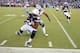 SAN DIEGO, CA - AUGUST 07: Ladarius Green #89 of the San Diego Chargers is pushed out of bounds by J.J. Wilcox #27 of the Dallas Cowboys during a preseason game at Qualcomm Stadium on August 7, 2014 in San Diego, California. (Photo by Stephen Dunn/Getty