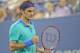 Aug 31, 2014; New York, NY, USA; Roger Federer (SUI) reacts during his match against Marcel Granollers (ESP) on day seven of the 2014 U.S. Open tennis tournament at USTA Billie Jean King National Tennis Center. Mandatory Credit: Susan Mullane-USA TODAY Sp