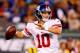 EAST RUTHERFORD, NJ - AUGUST 22: Eli Manning #10 of the New York Giants passes during the first quarter of a preseason game at MetLife Stadium on August 22, 2014 in East Rutherford, New Jersey. (Photo by Rich Schultz/Getty Images)