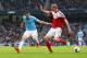 MANCHESTER, ENGLAND - MARCH 22: Alvaro Negredo of Manchester City and Brede Hangeland of Fulham compete for the ball during the Barclays Premier League match between Manchester City and Fulham at Etihad Stadium on March 22, 2014 in Manchester, England. (