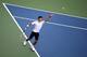 Novak Djokovic, seen here serving at the 2014 U.S. Open, has yet to drop a set.