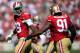 Aldon Smith and Ray McDonald, in happier times.