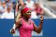 NEW YORK, NY - SEPTEMBER 01: Serena Williams of the United States celebrates match point to defeat Kaia Kanepi of Estonia in their women's singles fourth round match on Day Eight of the 2014 US Open at the USTA Billie Jean King National Tennis Center on