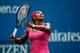NEW YORK, NY - SEPTEMBER 01: Serena Williams of the United States returns a shot to Kaia Kanepi of Estonia during their women's singles fourth round match on Day Eight of the 2014 US Open at the USTA Billie Jean King National Tennis Center on September 1