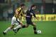 26 Oct 2000: Andrea Pirlo of Inter Milan beats Michael Kreek of Vitesse Arnhem during the UEFA Cup second round first leg match played at the San Siro, in Milan, Italy. The match ended in a 0-0 draw. \ Mandatory Credit: Stuart Franklin /Allsport