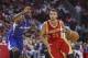 Mar 29, 2014; Houston, TX, USA; Houston Rockets forward Chandler Parsons (25) drives to the basket during the second quarter as Los Angeles Clippers guard Reggie Bullock (25) defends at Toyota Center. Mandatory Credit: Troy Taormina-USA TODAY Sports