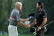 PARAMUS, NJ - AUGUST 24: Jim Furyk and Jason Day of Australia shake hands after finish on the 18th green during the final round of The Barclays at The Ridgewood Country Club on August 24, 2014 in Paramus, New Jersey. (Photo by Hunter Martin/Getty Images