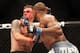 Feb 1, 2014; Newark, NJ, USA; Frank Mir (red gloves) fights Alistair Overeem (blue gloves) during UFC169 at Prudential Center. Mandatory Credit: Joe Camporeale-USA TODAY Sports