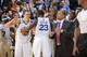 OAKLAND, CA - DECEMBER 3: David Lee #10 of the Golden State Warriors high fives teammate Draymond Green #23 during the game against the Toronto Raptors on December 3, 2013 at Oracle Arena in Oakland, California. NOTE TO USER: User expressly acknowledges a
