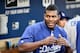 SAN DIEGO, CA - AUGUST 29: Yasiel Puig #66 of the Los Angeles Dodgers looks out from the dugout before a baseball game against the San Diego Padres at Petco Park August, 29, 2014 in San Diego, California. (Photo by Denis Poroy/Getty Images)