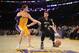 LOS ANGELES, CA - DECEMBER 20: Kevin Love #42 of the Minnesota Timberwolves drives against Pau Gasol #16 of the Los Angeles Lakers at Staples Center on December 20, 2013 in Los Angeles, California. NOTE TO USER: User expressly acknowledges and agrees that