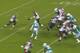 McCain (No. 47) earns free looks in the backfield from his effort and decisiveness