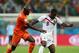 SALVADOR, BRAZIL - JULY 05: Bruno Martins Indi of the Netherlands challenges Joel Campbell of Costa Rica during the 2014 FIFA World Cup Brazil Quarter Final match between the Netherlands and Costa Rica at Arena Fonte Nova on July 5, 2014 in Salvador, Bra