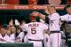 ANAHEIM, CA - AUGUST 29: Albert Pujols #5 of the Los Angeles Angels of Anaheim (C) returns to the dugout after hitting a homerun in the seventh inning against the Oakland Athletics at Angel Stadium of Anaheim on August 29, 2014 in Anaheim, California. (