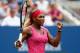NEW YORK, NY - SEPTEMBER 01: Serena Williams of the United States celebrates match point to defeat Kaia Kanepi of Estonia in their women's singles fourth round match on Day Eight of the 2014 US Open at the USTA Billie Jean King National Tennis Center on
