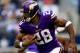 ARLINGTON, TX - NOVEMBER 03: Running back Adrian Peterson #28 of the Minnesota Vikings carries the ball during the game against the Dallas Cowboys at Cowboys Stadium on November 3, 2013 in Arlington, Texas. (Photo by Jamie Squire/Getty Images)