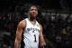 SAN ANTONIO, TX - JUNE 11: Tracy McGrady #1 of the San Antonio Spurs while playing against the Miami Heat in Game Three of the 2013 NBA Finals on June 11, 2013 at the AT&T Center in San Antonio, Texas. NOTE TO USER: User expressly acknowledges and agrees