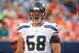 Aug 7, 2014; Denver, CO, USA; Seattle Seahawks guard Justin Britt (68) warms up before the preseason game against the Denver Broncos at Sports Authority Field at Mile High. Mandatory Credit: Chris Humphreys-USA TODAY Sports