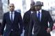 WASHINGTON - MARCH 4: DeMaurice Smith (R), NFLPA executive director, arrives with NFL Players Association Spokesman George Atallah (L) and Kansas City Chiefs player Brian Waters (C) for an extra day of negotiations at the Federal Mediation and Conciliatio