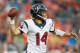 DENVER, CO - AUGUST 23: Quarterback Ryan Fitzpatrick #14 of the Houston Texans throws against the Denver Broncos during a preseason game at Sports Authority Field at Mile High on August 23, 2014 in Denver, Colorado. (Photo by Dustin Bradford/Getty Image