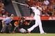 ANAHEIM, CA - AUGUST 27: Josh Hamilton #32 of the Los Angeles Angels of Anaheim hits an RBI double against the Miami Marlins in the third inning at Angel Stadium of Anaheim on August 27, 2014 in Anaheim, California. (Photo by Jeff Gross/Getty Images)