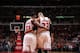 CHICAGO, IL - APRIL 4: Jimmy Butler #21 and Taj Gibson #22 of the Chicago Bulls share a word during the game against the Milwaukee Bucks on April 04, 2014 at the United Center in Chicago, Illinois. NOTE TO USER: User expressly acknowledges and agrees that